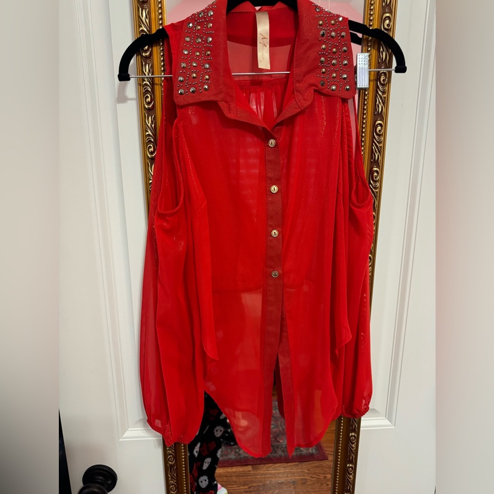 Red blouse with cutoff shoulders